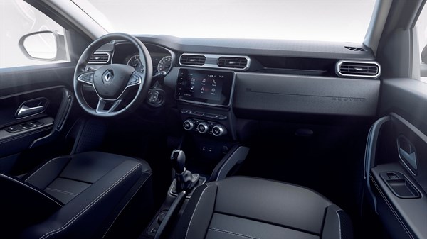 Renault Duster's interior view shows driver seat, steering wheels, and more