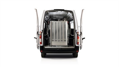 Back view of the white-colored Renault Master shown with doors opened